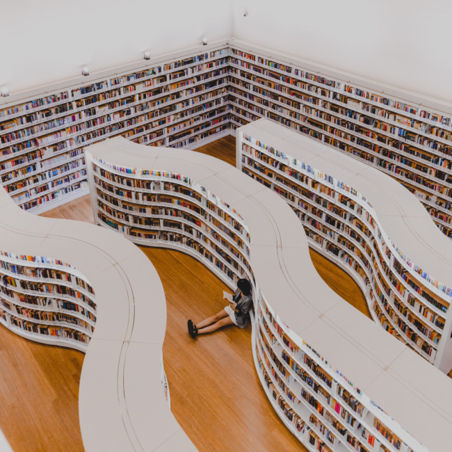 Person sitting in a library